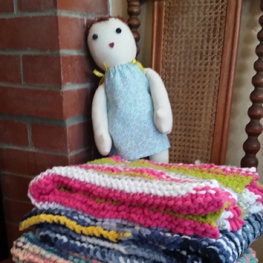 Dolls created and dressed by the Knitting Group to comfort dementia patients